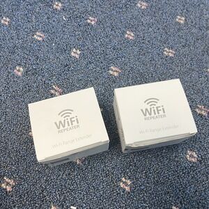 2.4G WiFi Repeater 300Mbps WIFI Range Extender Wireless Booster Never Used 2 NEW
